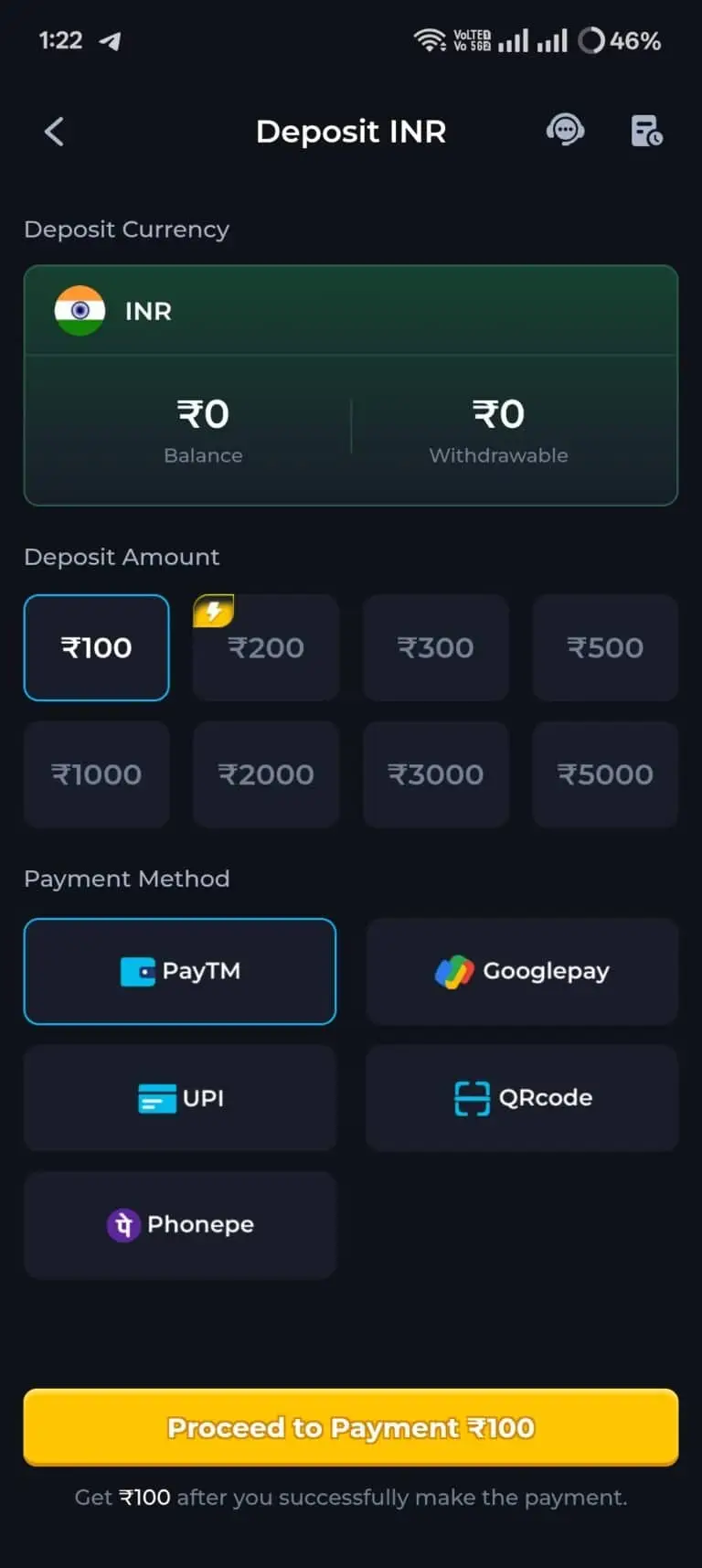 Khelx Game app interface showing the deposit INR page. The screen displays a zero balance, deposit amount options ranging from ₹100 to ₹5000, and payment methods including PayTM, Google Pay, UPI, QRcode, and PhonePe. The PayTM option and ₹100 amount are highlighted, with a yellow 'Proceed to Payment ₹100' button at the bottom.