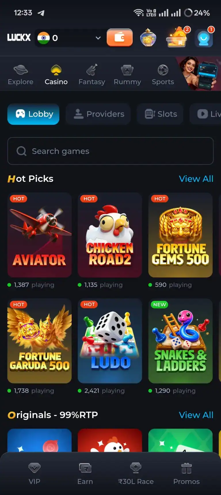LUCKX Game casino lobby screen displaying Hot Picks games like Aviator, Chicken Road 2, Fortune Gems 500, Ludo, and Snakes & Ladders. Start your LUCKX Game Download to access 99% RTP Originals and live casino action.